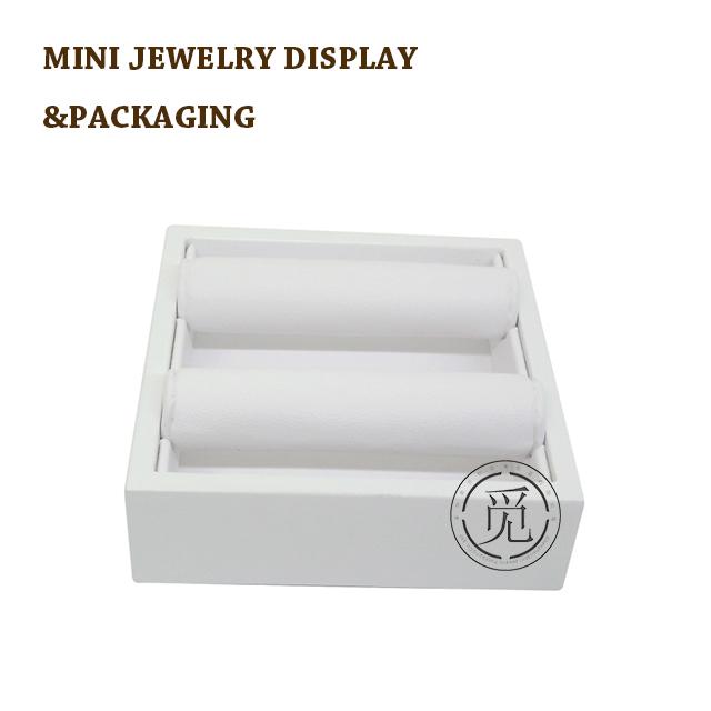 White laquer with leather display ring tray je