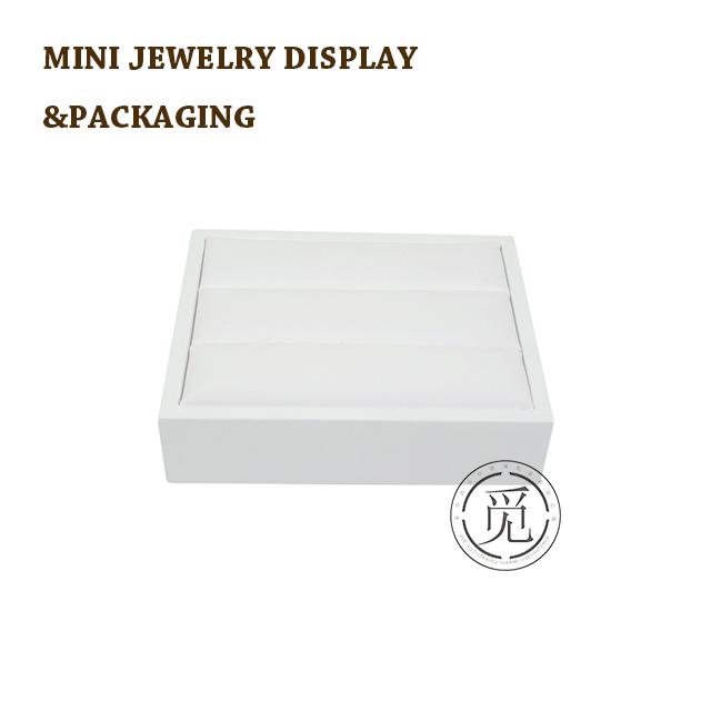 White leather rings jewelry display stand ring